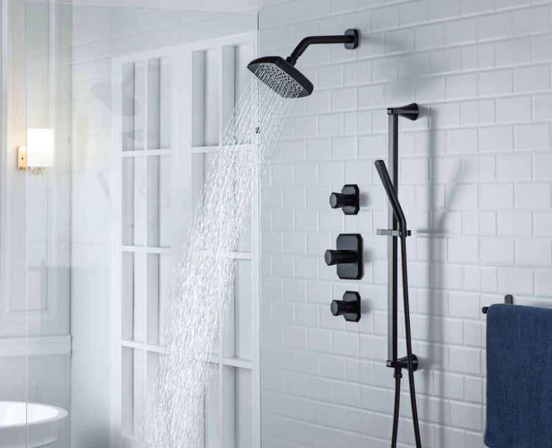 matte black shower set on white marble